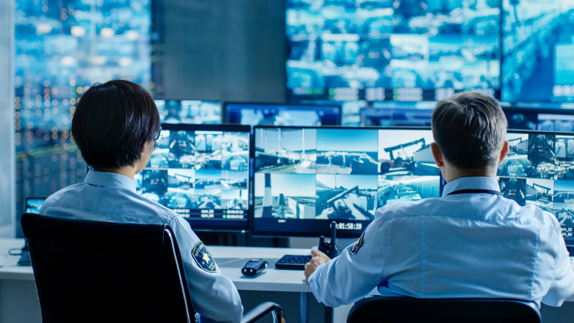 Operators monitoring AI-powered video analytics in a control room